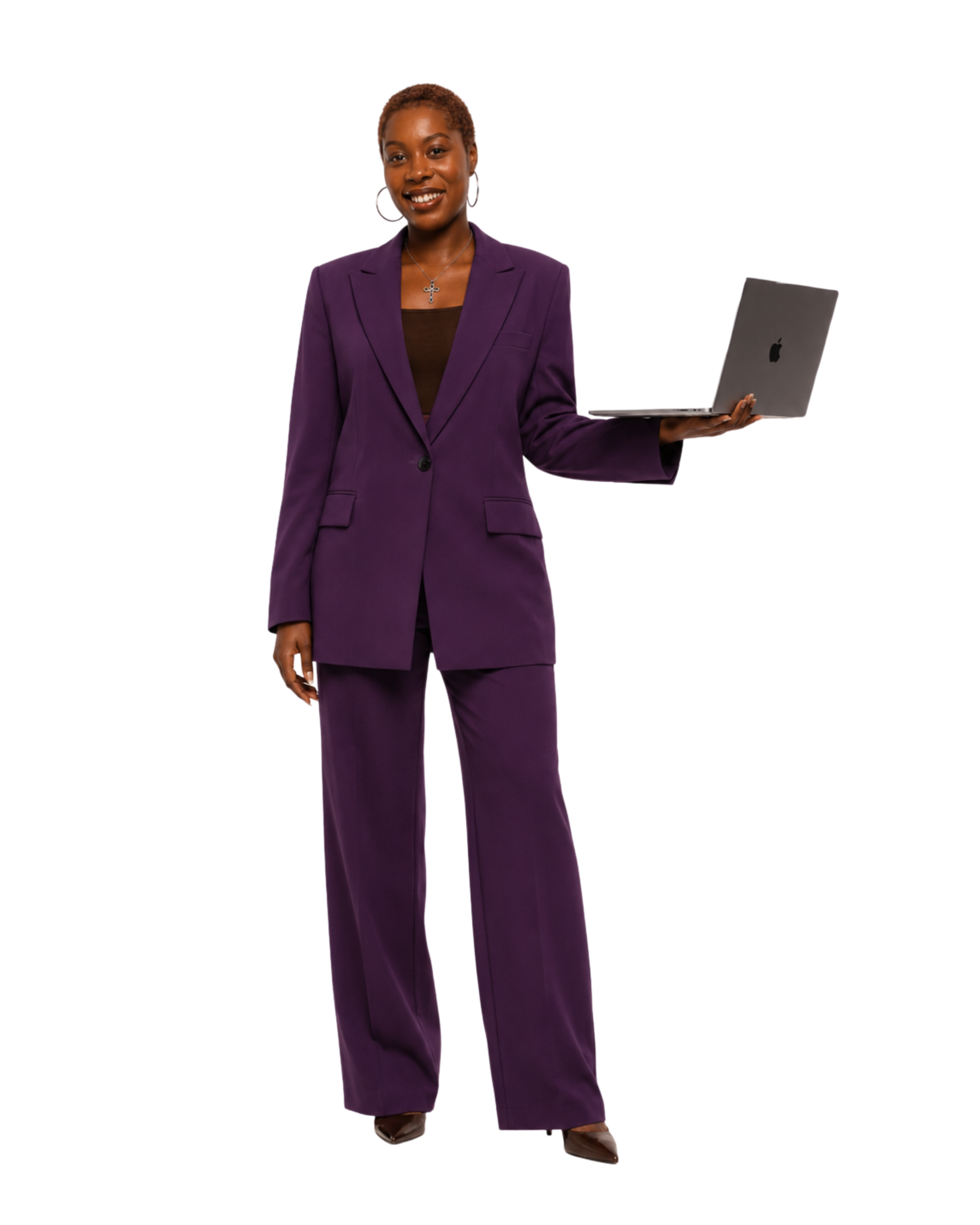 Agapé Cogswell, founder, holding a laptop